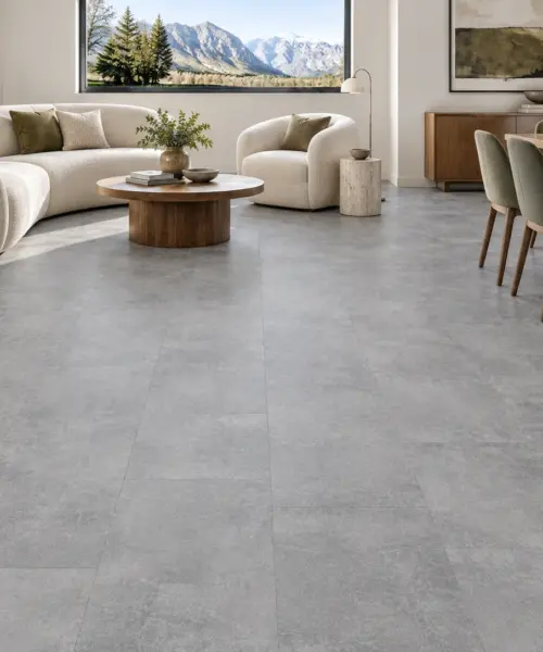 Industrial Grey installed flooring in a furnished daylight interior; accurate product scale visualization (NIndG9.5)