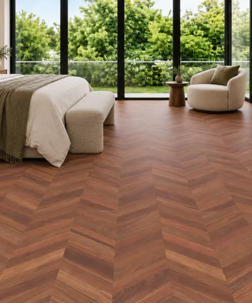 Noble Chevron installed flooring in a furnished daylight interior; accurate product scale visualization (FNob11)