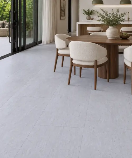Snowstone installed flooring in a furnished daylight interior; accurate product scale visualization (MCSnows7.5)