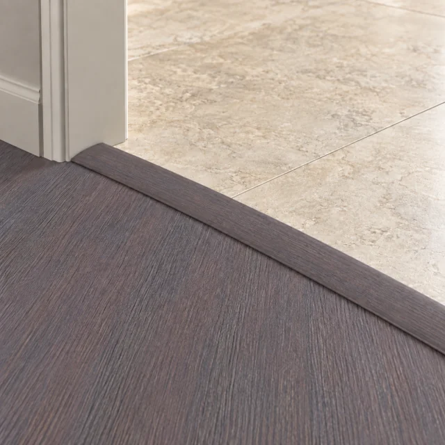 Ashen Chestnut T-molding transition — installed view with product profile inset