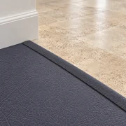 Black Buffalo T-molding transition — installed view