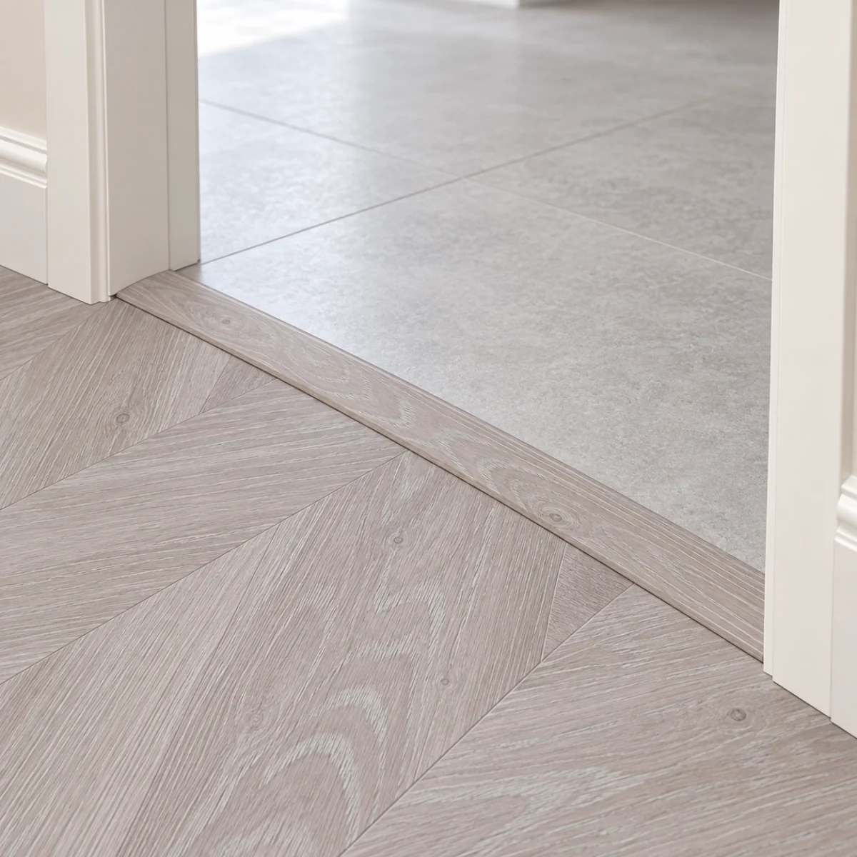 Clara Chevron T-molding transition — installed view with product profile inset