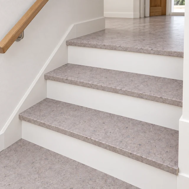 Grano stair nosing — installed view with product profile inset