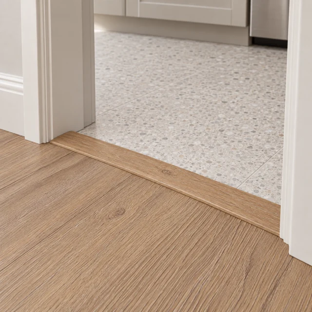 Honey Oak T-molding transition — installed view with product profile inset