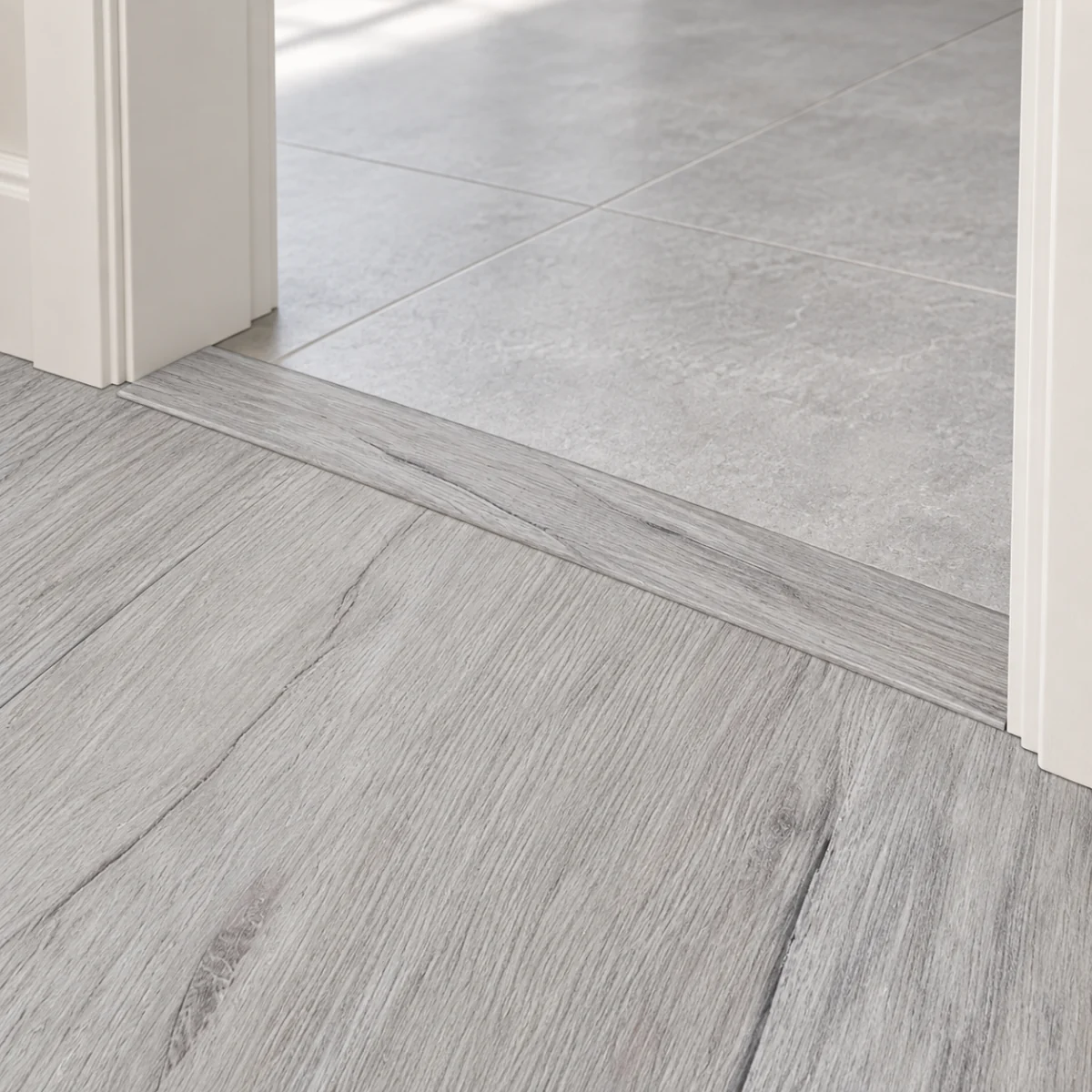 Light Grey Oak T-molding transition — installed view with product profile inset
