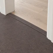 Night T-molding transition — installed view