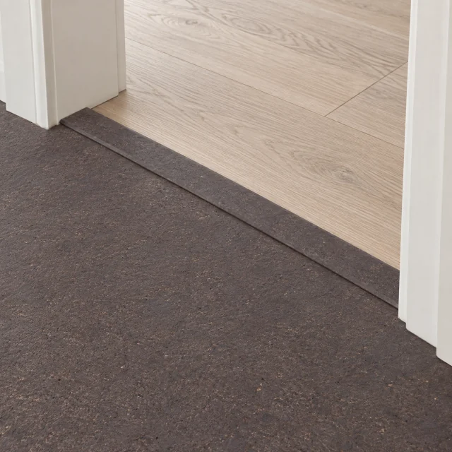Night T-molding transition — installed view with product profile inset