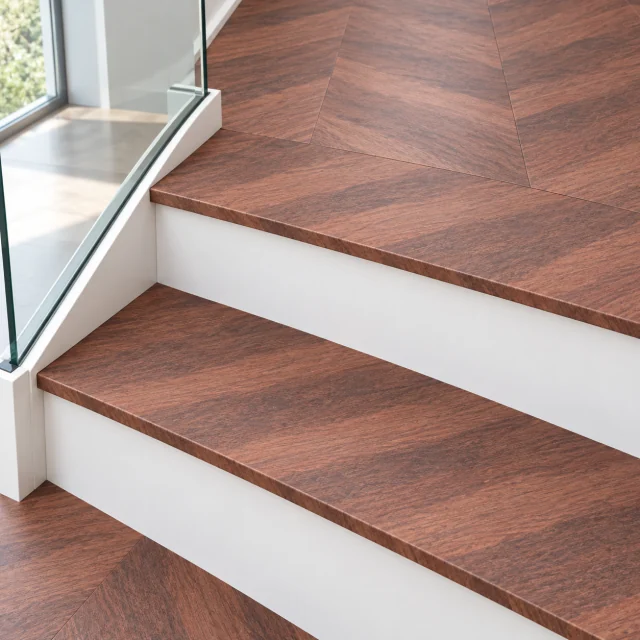 Noble Chevron stair nosing — installed view with product profile inset