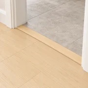 Pinewood T-molding transition — installed view
