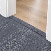 Serpent Luxe T-molding transition — installed view