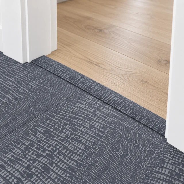 Serpent Luxe T-molding transition — installed view with product profile inset
