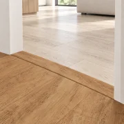 Spanish Cedar T-molding transition — installed view