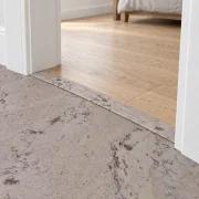 Umber Grey T-molding transition — installed view