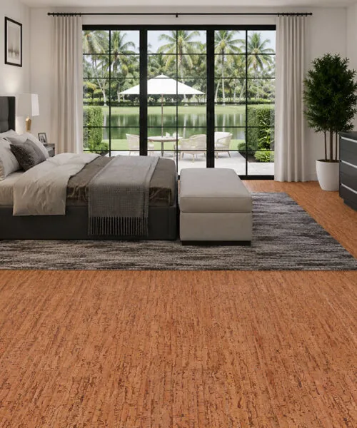Spacious master bedroom with Amber Streak 12mm cork flooring, offering a comfortable and natural cork floor finish.