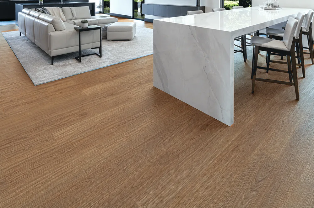 American Red Oak - 7/16" (11mm) - Swiss Design Cork Floating (FRed11) Medium-brown American Red Oak cork floor connecting a contemporary living room and dining area