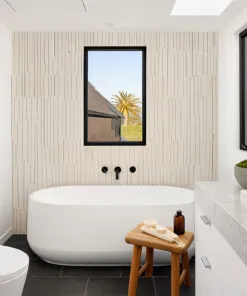 Sustainable Arctic Slate cork wall cladding behind bathtub, textured linear design for style and noise reduction