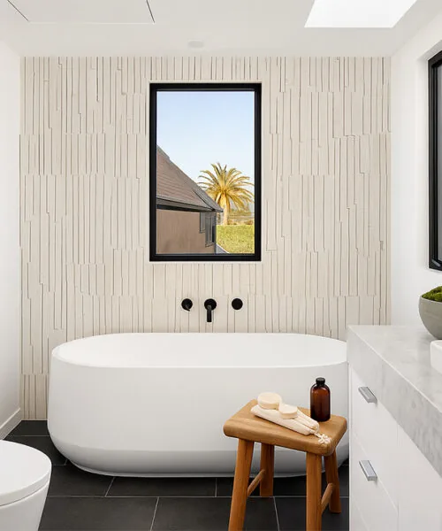 Arctic Slate - 1/2" (12mm) - Cork Wall Tile (WArcSlt12) Sustainable Arctic Slate cork wall cladding behind bathtub, textured linear design for style and noise reduction