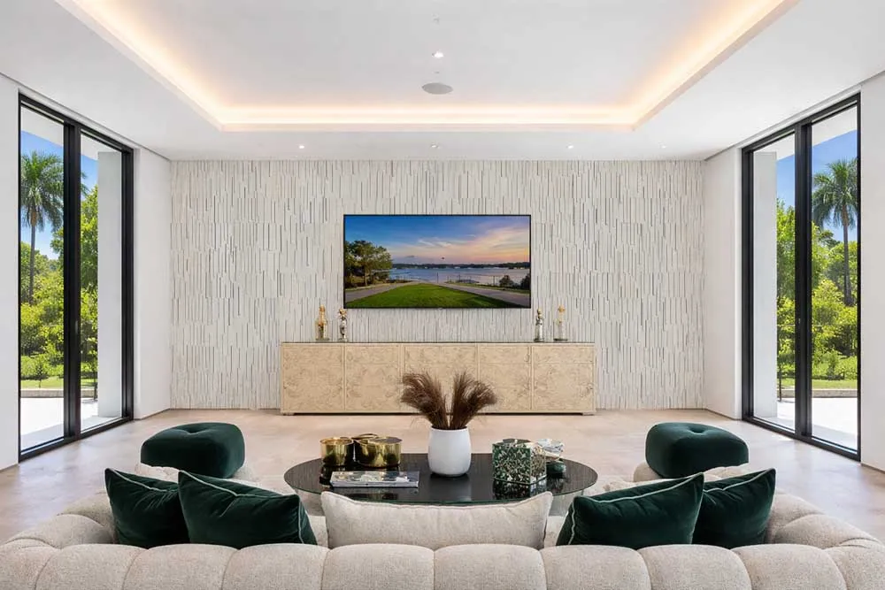 Arctic Slate 3D acoustic wall panels adding texture and sound absorption to a modern living room TV wall