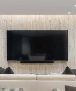 Decorative Arctic Slate cork wall finish in media room, eco-friendly acoustic tiles that minimize echo and reverberation.