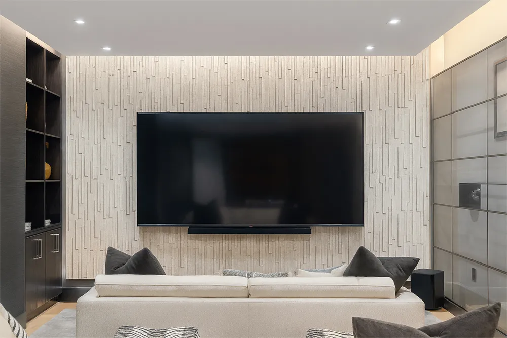 Decorative Arctic Slate cork wall finish in media room, eco-friendly acoustic tiles that minimize echo and reverberation.