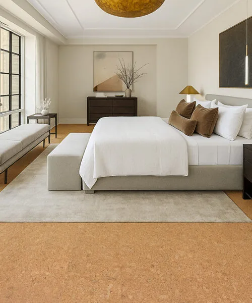 Autumn Leaves - 1/2" (12mm) - Cork Floating (FAL12) Modern bedroom with Autumn Leaves 12mm cork flooring, warm natural tones, and large windows providing bright daylight.