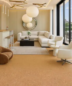 Elegant living room with Autumn Leaves natural cork flooring 12mm, white sectional sofa, and panoramic window views.