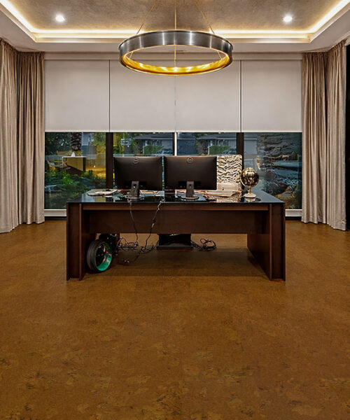 Autumn Ripple cork flooring in a modern home office with desk, glass walls, and ambient lighting