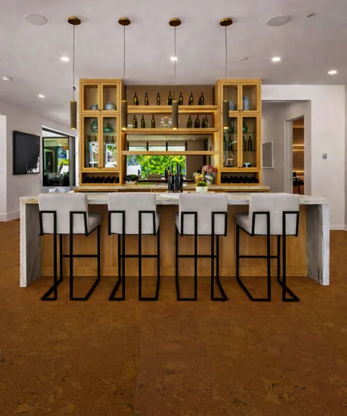 Autumn Ripple - 1/2" (12mm) - Cork Floating (FAR12) Autumn Ripple cork flooring in an open concept kitchen with island seating and modern cabinetry