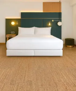 Stylish bedroom with Berber cork flooring and soft lighting—quiet, comfortable, and ideal for restful, healthy living.