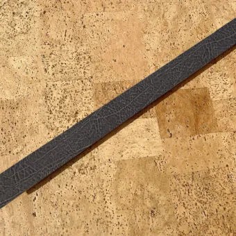 Black buffalo swiss custom manufactured leather stair nosing.