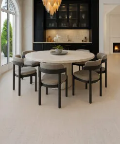 Light bleached cork flooring adding warmth and sound-reduction to a stylish dining room.