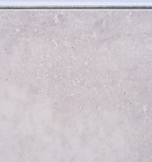 Bright Stone Swiss TechSlate flooring featuring a realistic gray slate stone appearance, durable natural cement fiberboard construction, waterproof floating floor system, and contemporary stone-look design.