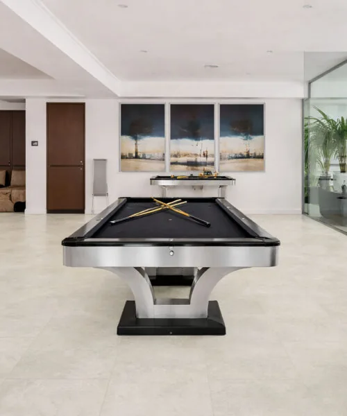 Bright Stone - 19/64" (7.5mm) - Swiss Techslate (MBrSt7.5) Modern recreation room with durable stone-look flooring and minimalist design