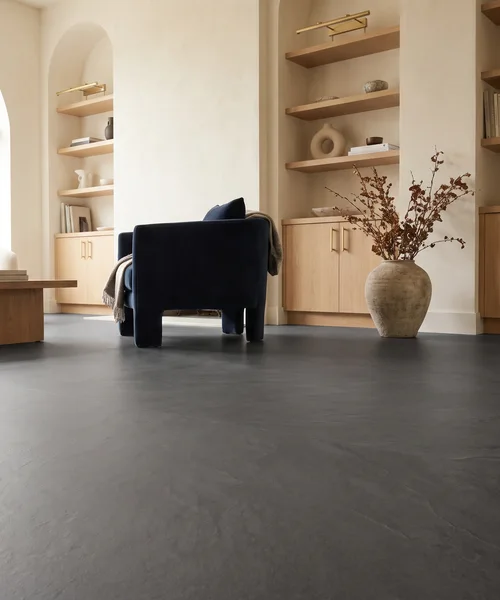 Bright Stone - 19/64" (7.5mm) - Swiss Techslate (MBrSt7.5) Large-format stone-style flooring flowing through a contemporary hallway and staircase