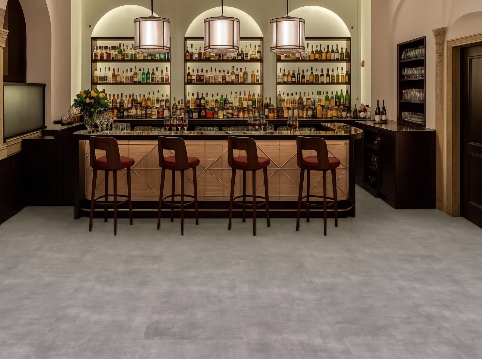 Concrete Alloy Techslate flooring in a refined bar interior with flat matte floor