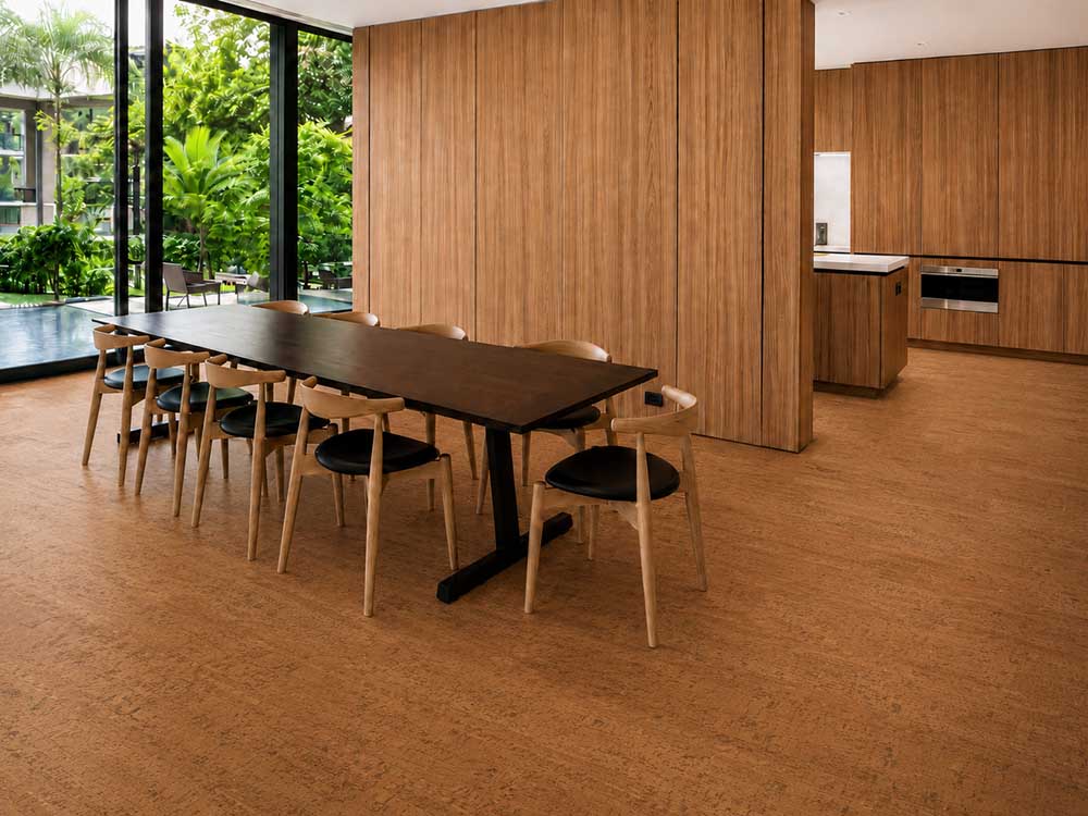 Cherry Line - 7/16" (11mm) - Swiss Real Cork Floating (FCHL11) Reddish-brown Cherry Line floating cork flooring with linear texture beneath a spacious dining table.