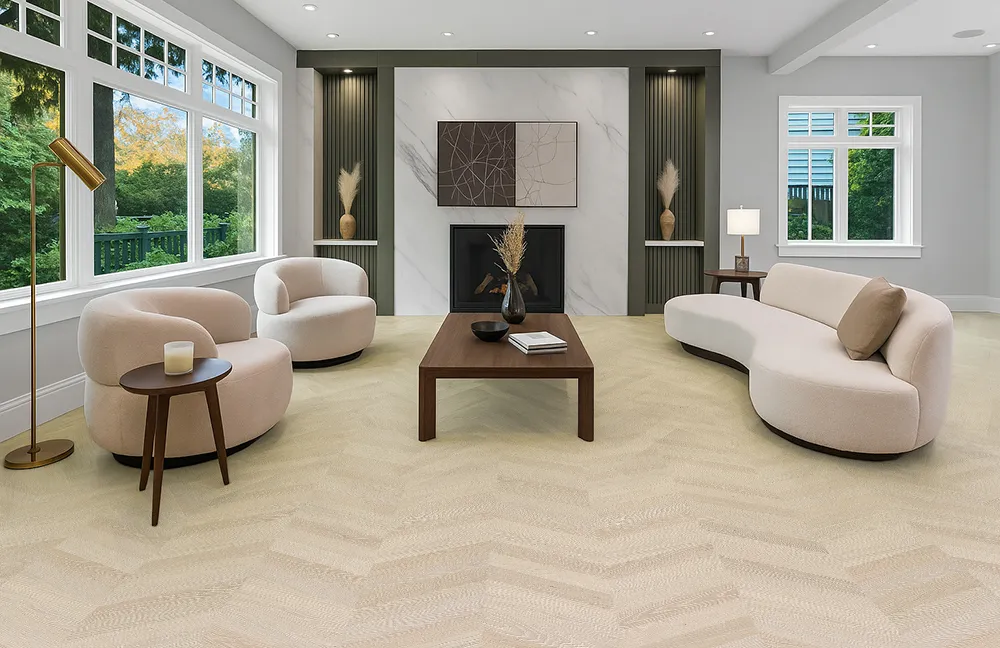 Elegant living room showcasing pale Clara Chevron cork flooring with modern curved furniture.