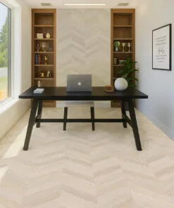 Bright home office with a large desk and light Clara Chevron cork flooring arranged in a chevron pattern.