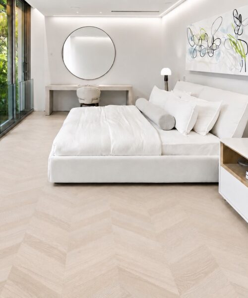 Canada's best Cork Flooring, Wall Tiles and Underlayment Clara Chevron eco-friendly cork flooring creates a calm geometric foundation in a white garden-view bedroom.