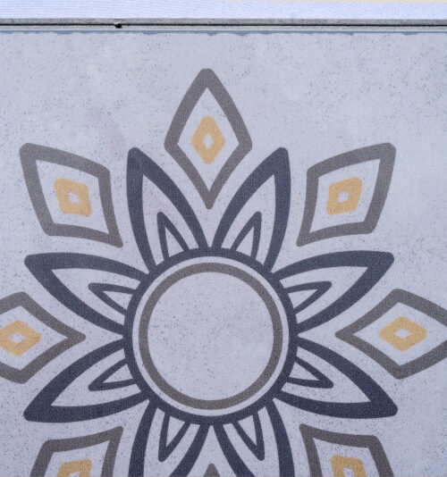 Classic Porcelain Swiss TechSlate flooring with an elegant floral medallion design, authentic porcelain tile appearance, subtle gray and gold accents, and durable modern flooring construction.