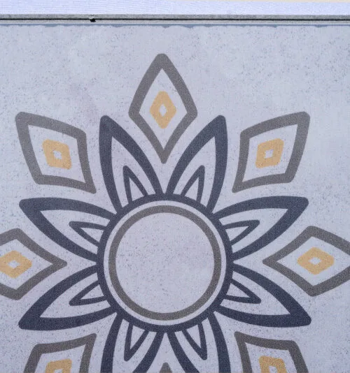 Classic Porcelain Swiss TechSlate flooring with an elegant floral medallion design, authentic porcelain tile appearance, subtle gray and gold accents, and durable modern flooring construction.