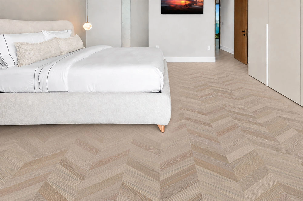 Aurora Chevron - 7/16″ (11mm) - Swiss Design Cork Floating (FAuro11) Aurora Chevron installed flooring in a furnished daylight interior; reviewed room view (FAuro11)