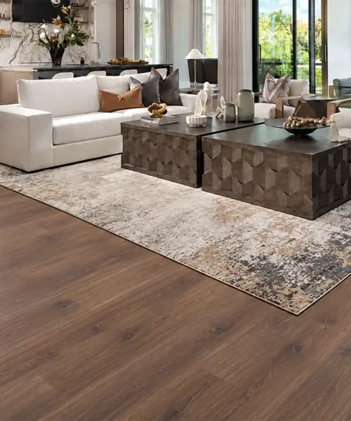 Latte installed flooring in a furnished daylight interior; reviewed room view (FLat11)