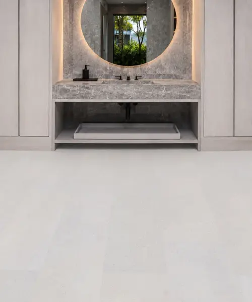 White Leather - 1/4" (6mm) - Cork Glue Down Tile (GWL6) White Leather installed flooring in a furnished daylight interior; reviewed room view (PF3384VWN-6.0)