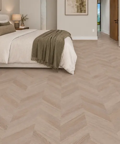 Aurora Chevron installed flooring in a furnished daylight interior; accurate product scale visualization (FAuro11)