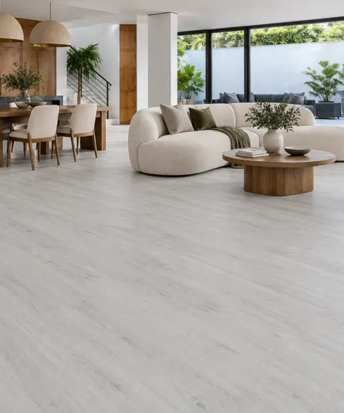 Como Oak White installed flooring in a furnished daylight interior; accurate product scale visualization (FCOW11)