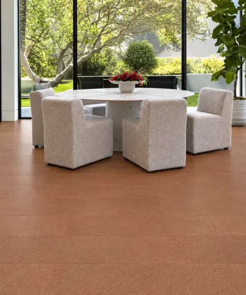 Cocoa Tan installed flooring in a furnished daylight interior; accurate product scale visualization (LCocTan10.5)