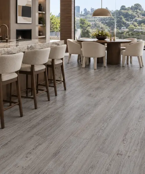 Earthy Pine installed flooring in a furnished daylight interior; accurate product scale visualization (NEthPin9.5)