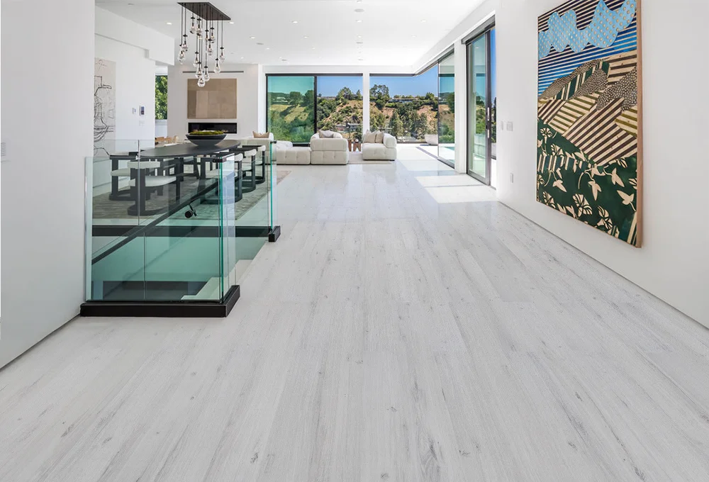 Como Oak White - 7/16" (11mm) - Swiss Design Cork Floating (FCOW11) Como White Oak Swiss Design cork floating floor in a modern open-concept home