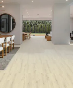 Spacious combined living and dining area with Como Oak White Swiss Cork Design Floating Flooring, modern wood table, and large circular mirror. featuring black chairs and minimalist wall art.